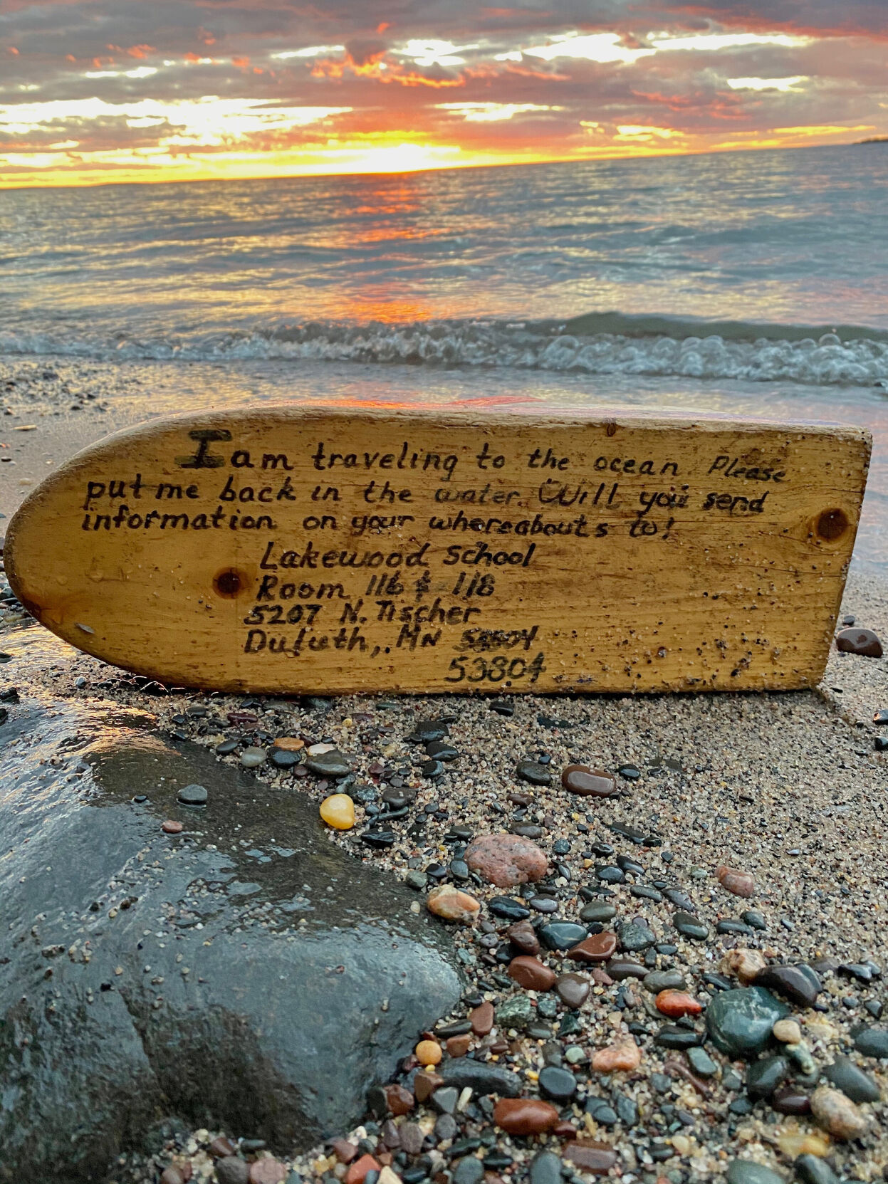 A tiny boat was discovered on a remote beach 27 years after it was launched by teachers